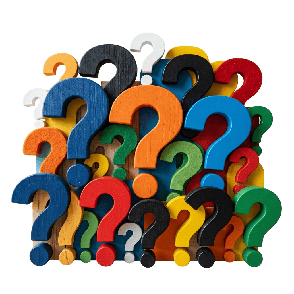 Colorful wooden question marks arranged in a playful stack